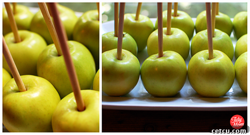 Blue candy apples cooling on wax paper