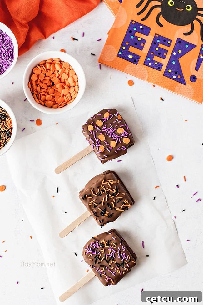Halloween S'mores Pops with a festive napkin, showcasing their delicious and appealing look.