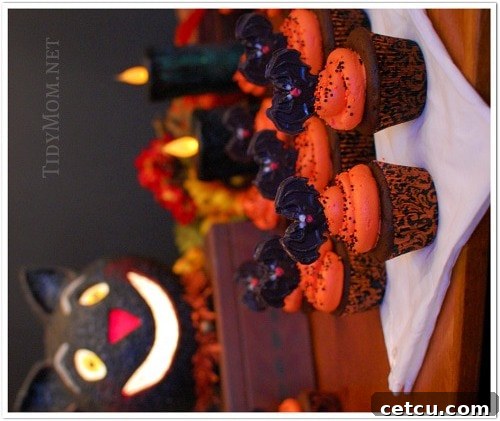 Delicious Halloween cupcakes adorned with spooky bats.