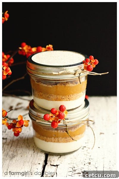Layered pumpkin pie dessert served in a glass jar