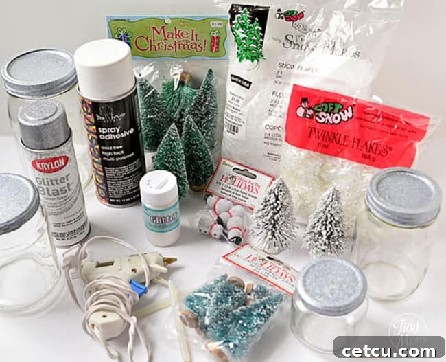 A collection of supplies needed for making waterless snow globes, neatly arranged.