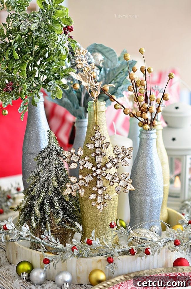Empty Coca-Cola bottles painted with glitter, arranged as a pretty holiday table centerpiece.