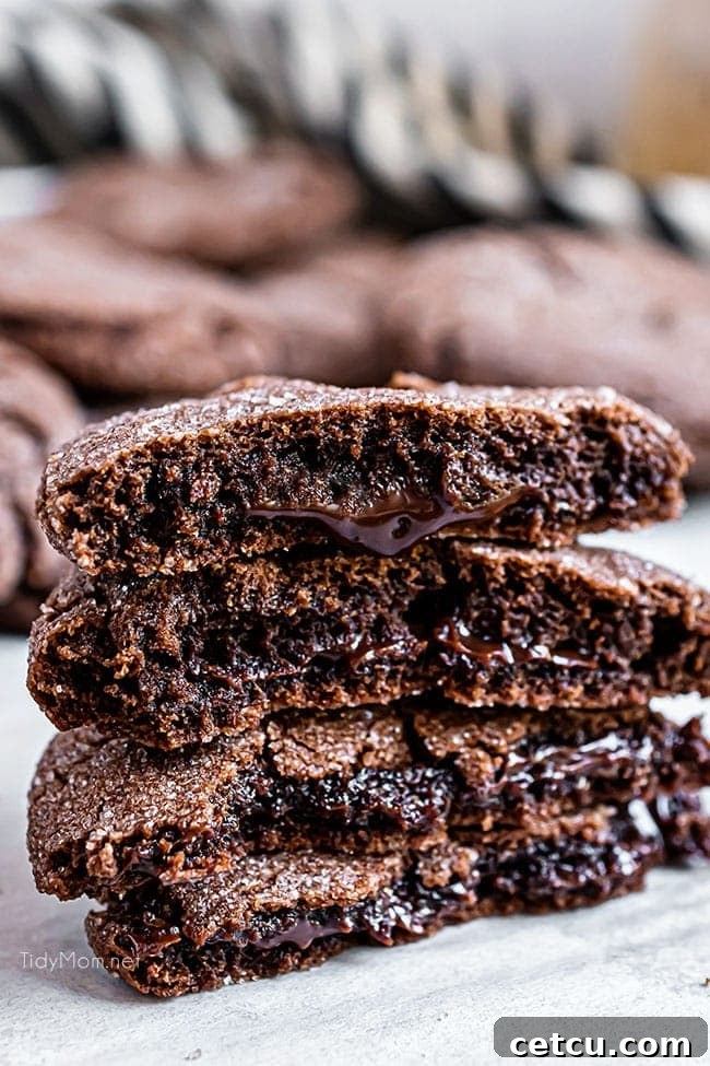 A tempting stack of rich chocolate lava cookies, showcasing their gooey, decadent centers.