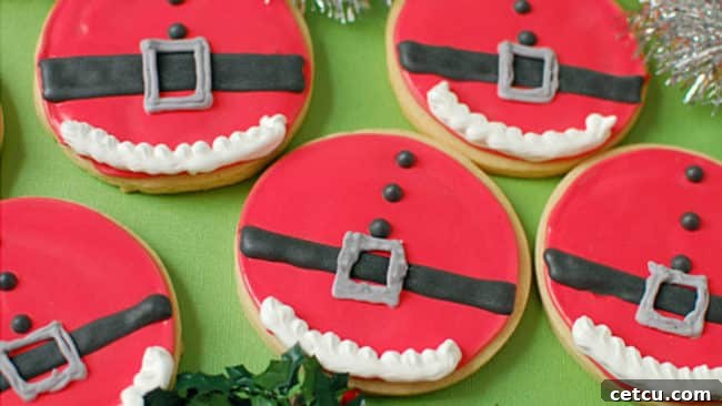 Fun and festive Santa Belly Cookies, decorated to resemble Santa's cheerful midsection.