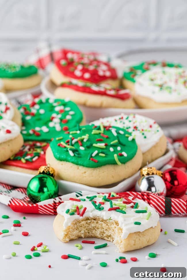 An inviting image of holiday cookies on a counter, with one cookie playfully showing a bite taken out, highlighting its deliciousness.