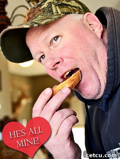 A heartwarming image of a person proudly holding a freshly baked loaf of artisan bread, symbolizing the joy of homemade baking.