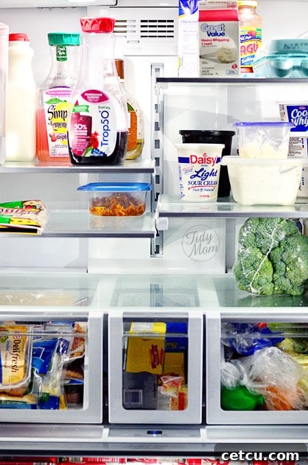 Clean refrigerator for holiday hosting at TidyMom.net