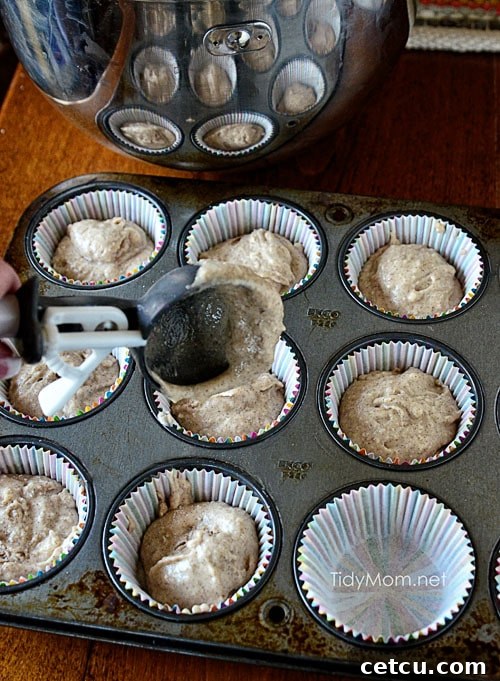 Ice cream scooper used to fill cupcake liners with batter.