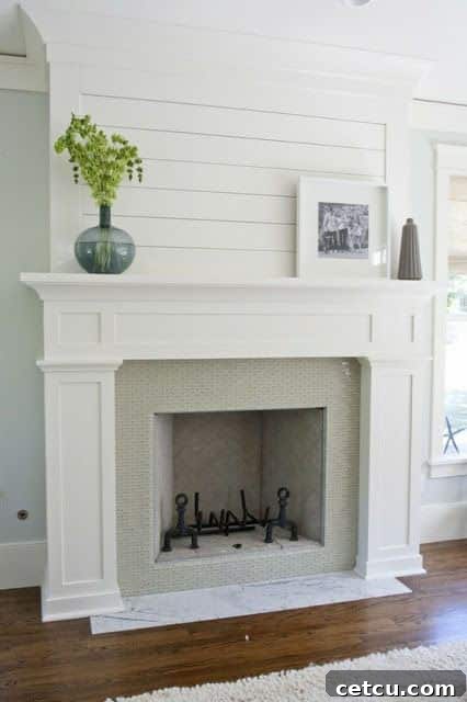 plank wall treatment over fireplace mantel - Custom fireplace design