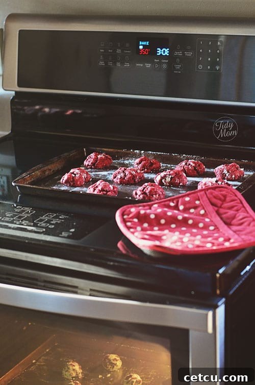 Red Velvet Cookies baking in the oven, turning golden brown