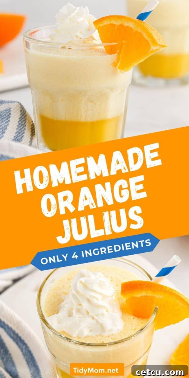 A tall glass of homemade Orange Julius, beautifully topped with whipped cream, photographed from a high angle for a tempting and inviting view.