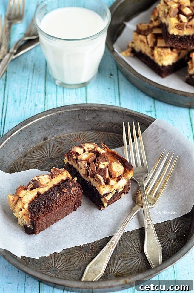 Close-up of Peanut Butter Snickers Cheesecake Brownies at TidyMom.net