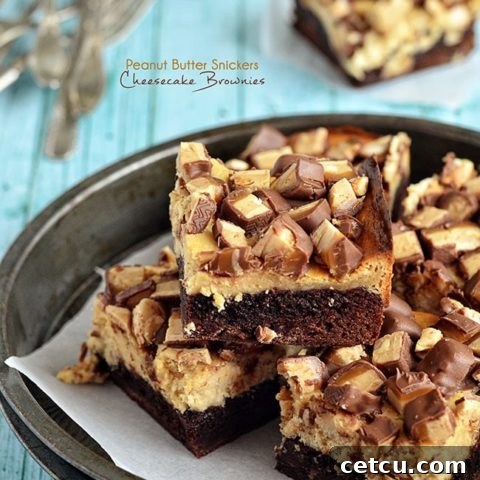 Peanut Butter Snickers Cheesecake Brownies at TidyMom.net