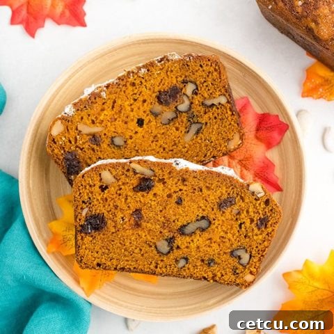 Two slices of pumpkin bread on a plate