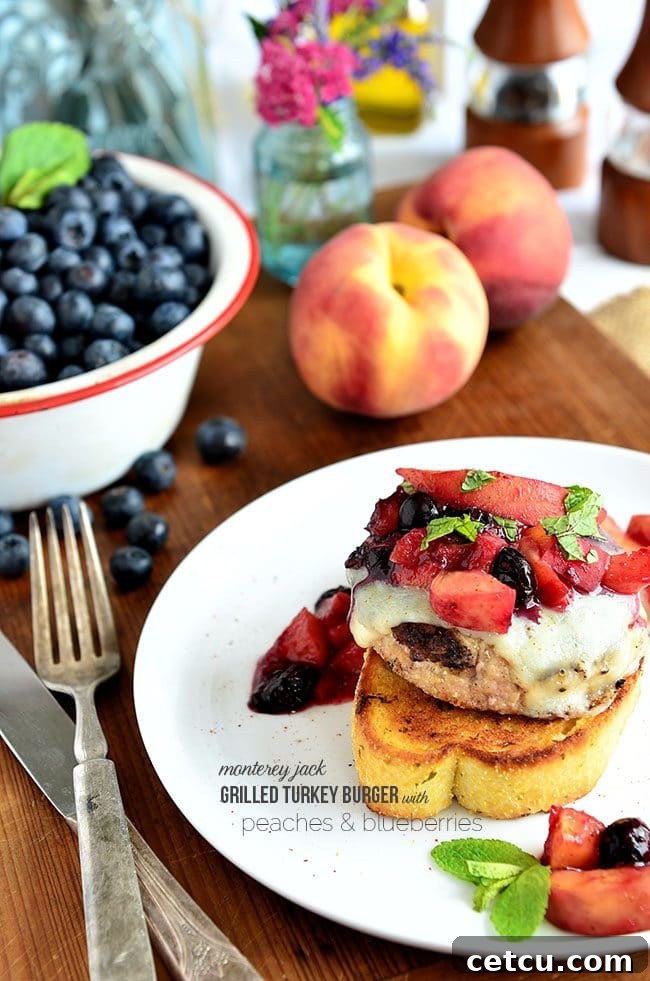 Delicious Monterey Jack Grilled Turkey Burger with Peaches and Blueberries recipe from TidyMom.net