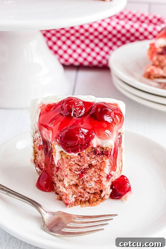 heart shaped cheery cake with bite missing