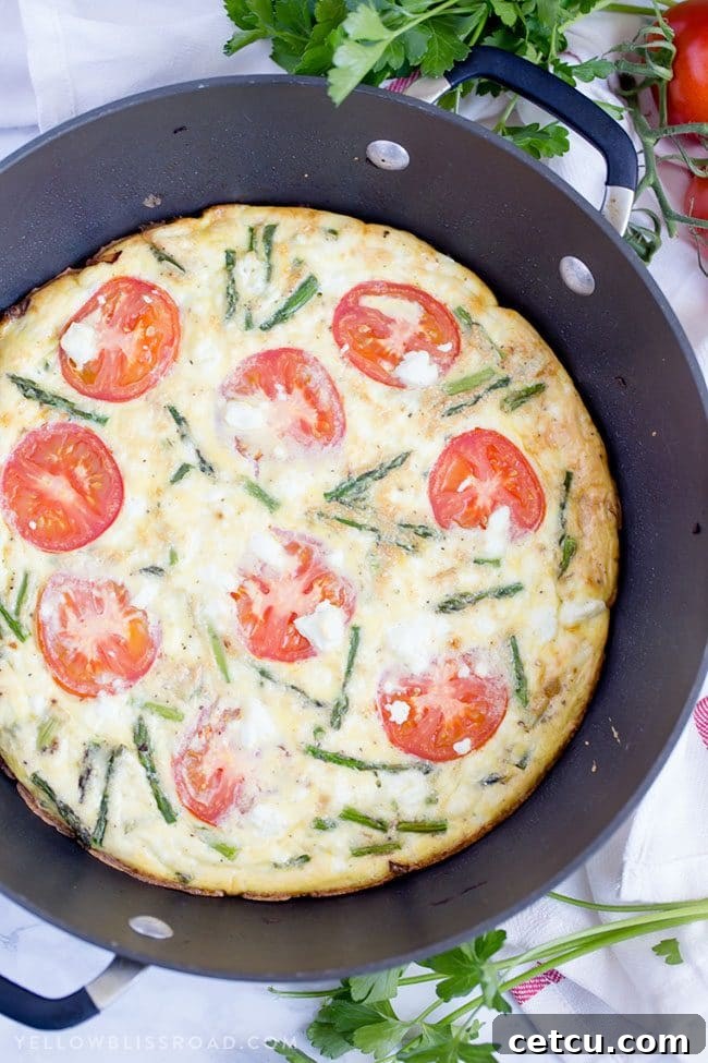 Mother’s Day Brunch Meal Plan recipes, printables and decor at TidyMom.net - Asparagus, Tomato and Goat Cheese Frittata recipe