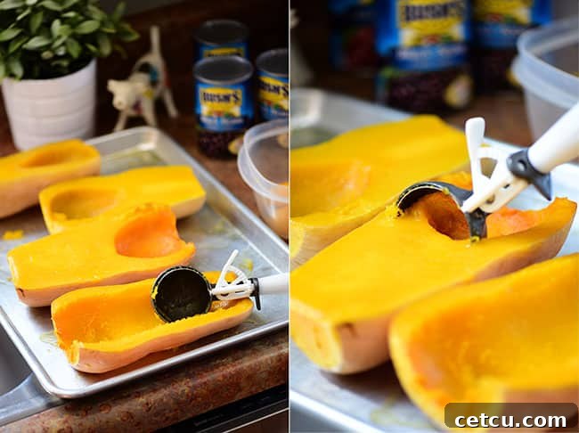 Scooping out roasted butternut squash for stuffing