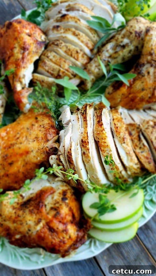 A beautifully roasted Mayonnaise Turkey, golden-brown and glistening, ready to be carved for Thanksgiving dinner.