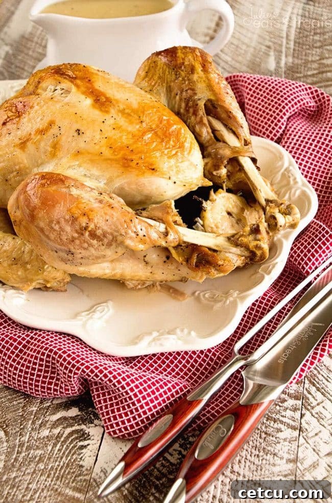 A slow cooker filled with succulent Make Ahead Turkey from Julie's Eats & Treats, perfectly cooked and ready to be served.