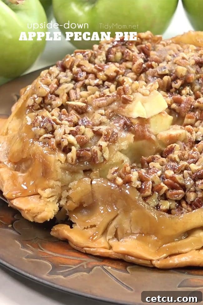 An award-winning Upside-Down Apple Pecan Pie, featuring a golden-brown, caramelized topping and a rustic presentation.