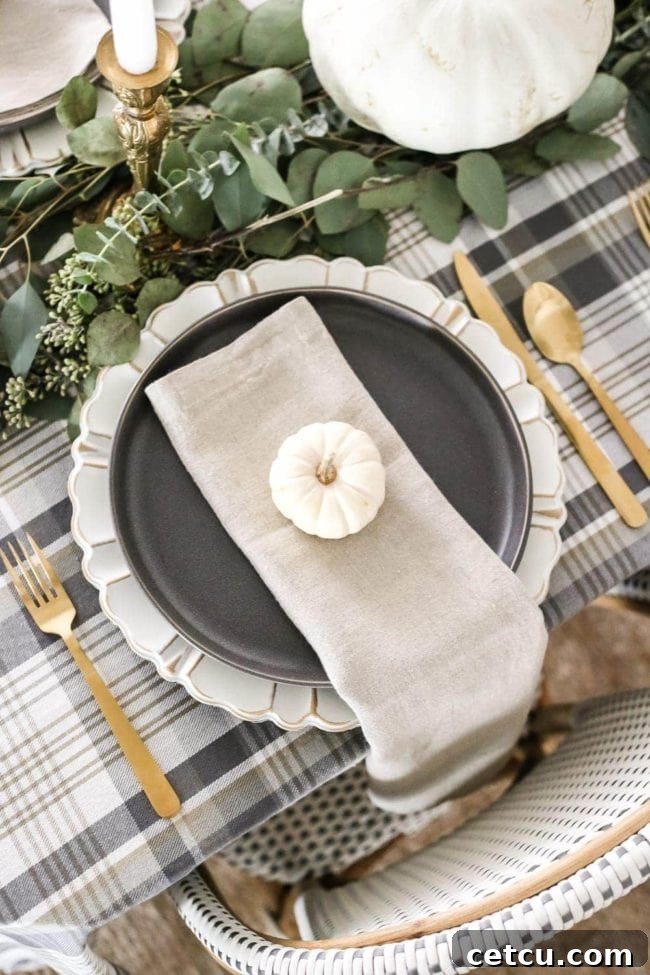 A serene and inviting Neutral Low-Key Thanksgiving Tablescape, featuring natural elements and subtle decor for a warm ambiance.
