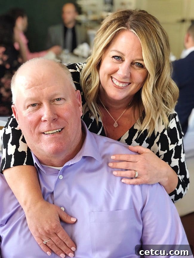 Tidy Mom and Dad, Cheryl and Steve, celebrate their 32nd wedding anniversary with a happy photo, reflecting years of cherished memories and enduring partnership.