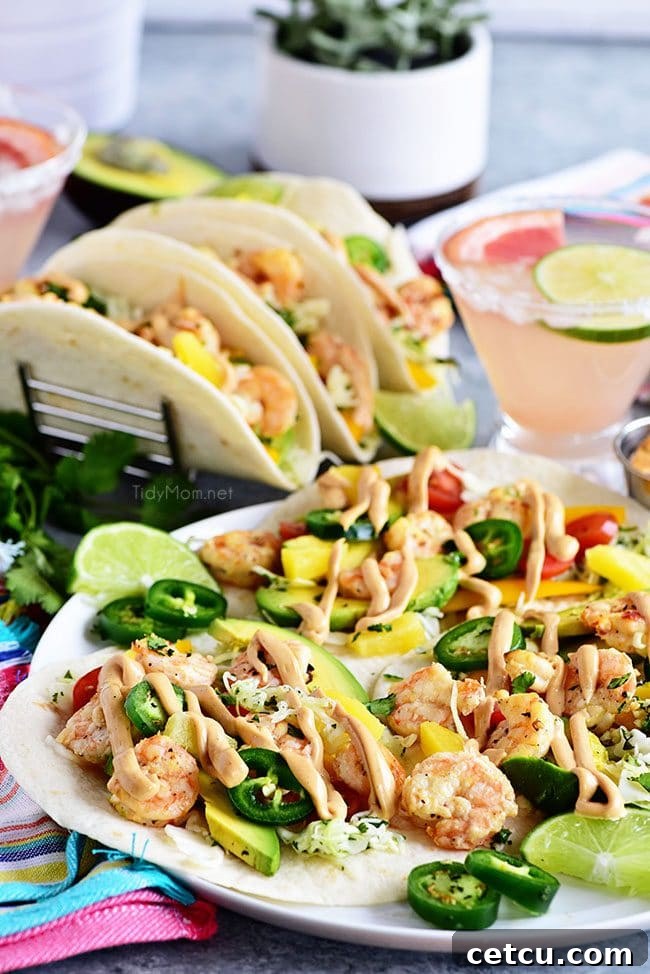 A beautifully arranged plate of Baja Shrimp Tacos, ready to be enjoyed.