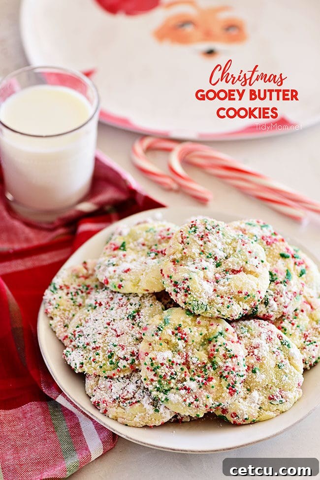 Christmas Gooey Butter Cookies on a plate with a glass of milk