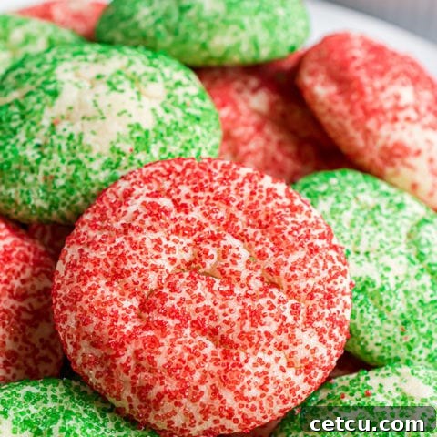 A pile of red and green Christmas drop cookies, illustrating the festive appeal of the recipe.