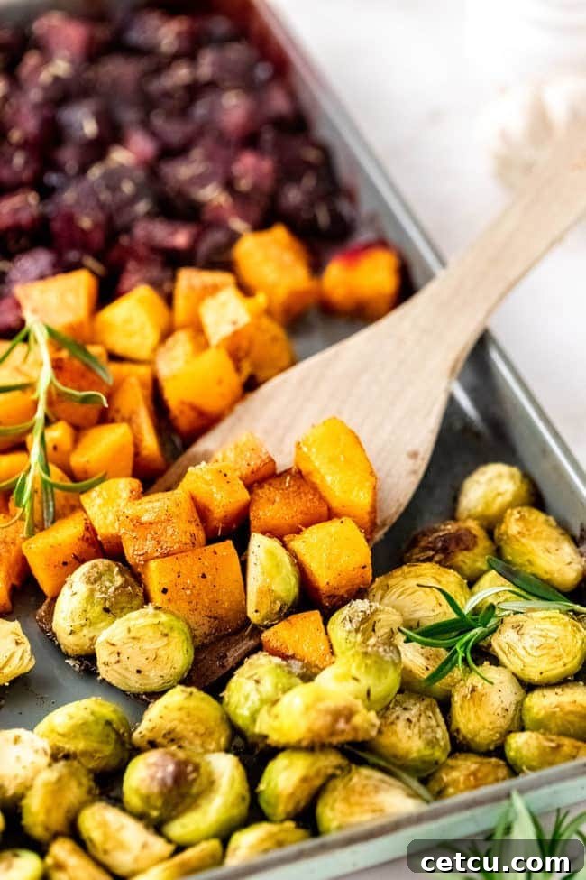A close-up shot of perfectly roasted butternut squash cubes, showing their caramelized edges and tender texture.