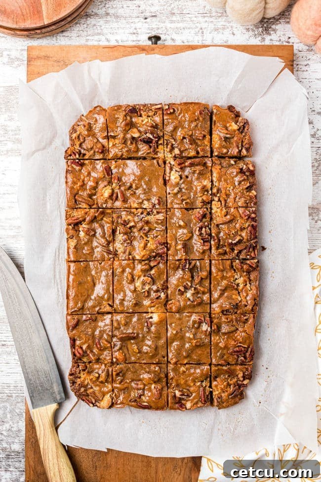 Autumn's Magical Seven Layer Pumpkin Bars 10 pan of Pumpkin Magic Bars, freshly cut into squares and ready for serving