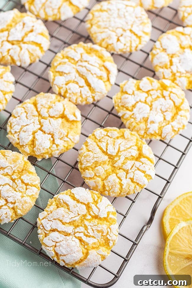 Lemon cool whip cookies cooling on a wire rack