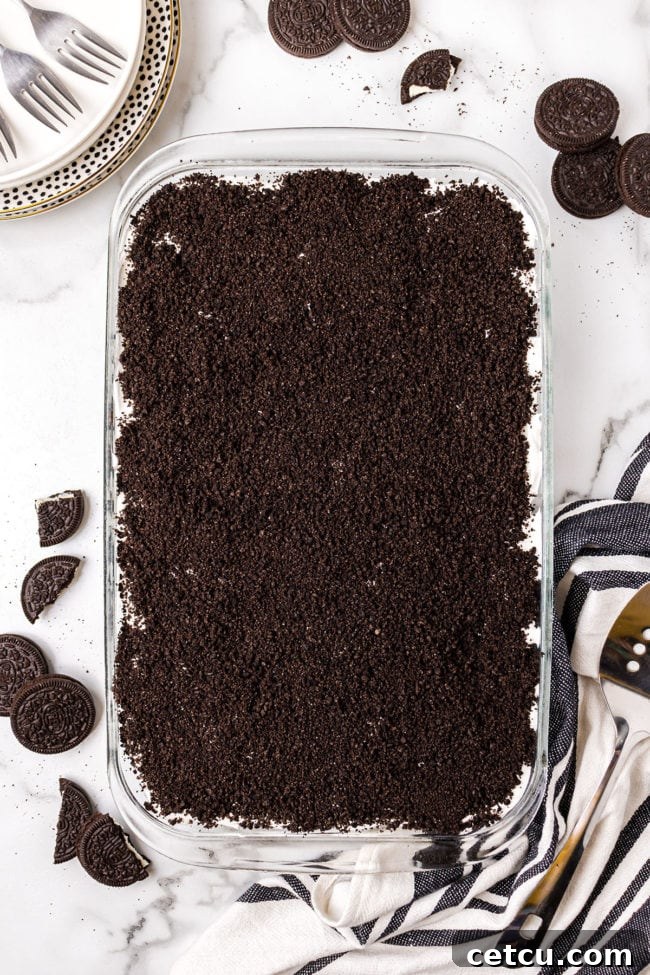 Step 9: The finished No-Bake Oreo Delight, covered and chilling in the refrigerator.