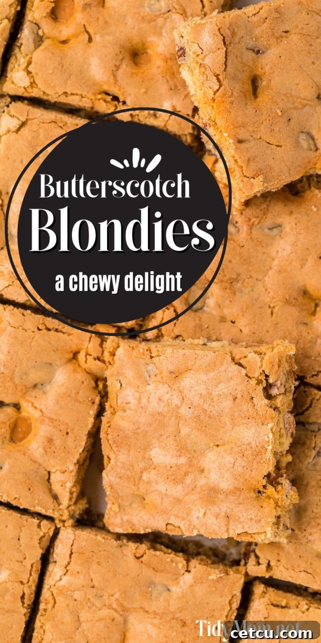 Close up of golden butterscotch blondies cut into squares and piled on a rustic wooden table, emphasizing their chewy texture and delicious appearance.
