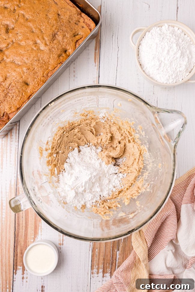 making frosting in a glass mixing bowl