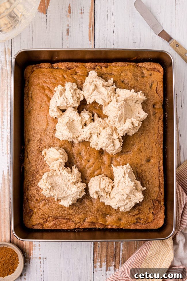 dollops of frosting on a cake