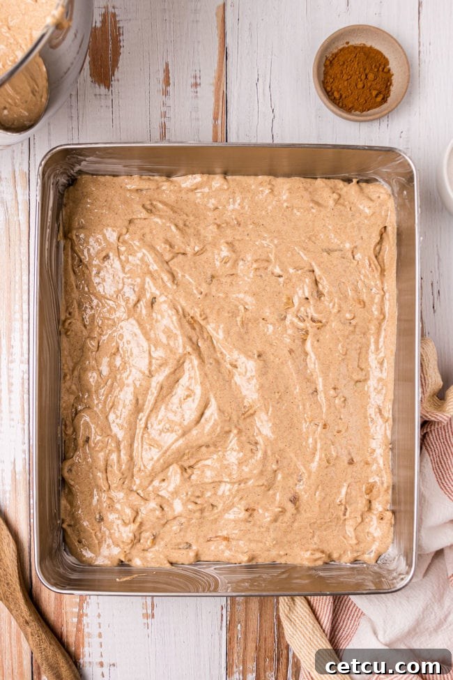 cake filling poured in 9x13 metal cake pan