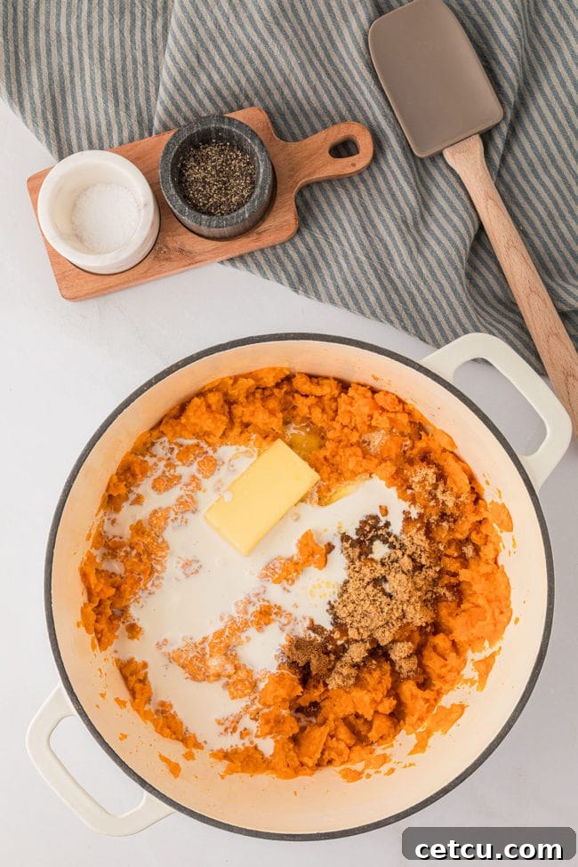 butter, milk and brown sugar added to cooked sweet potatoes