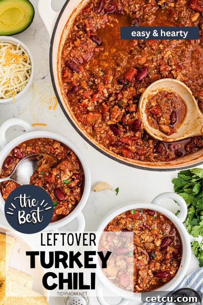 A beautiful arrangement of a large pot and several bowls of hearty turkey chili, ready to be enjoyed.