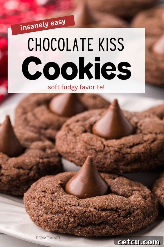 A top-down view of perfect chocolate cookies, each adorned with a classic Hershey's Kiss, making for an inviting dessert presentation.