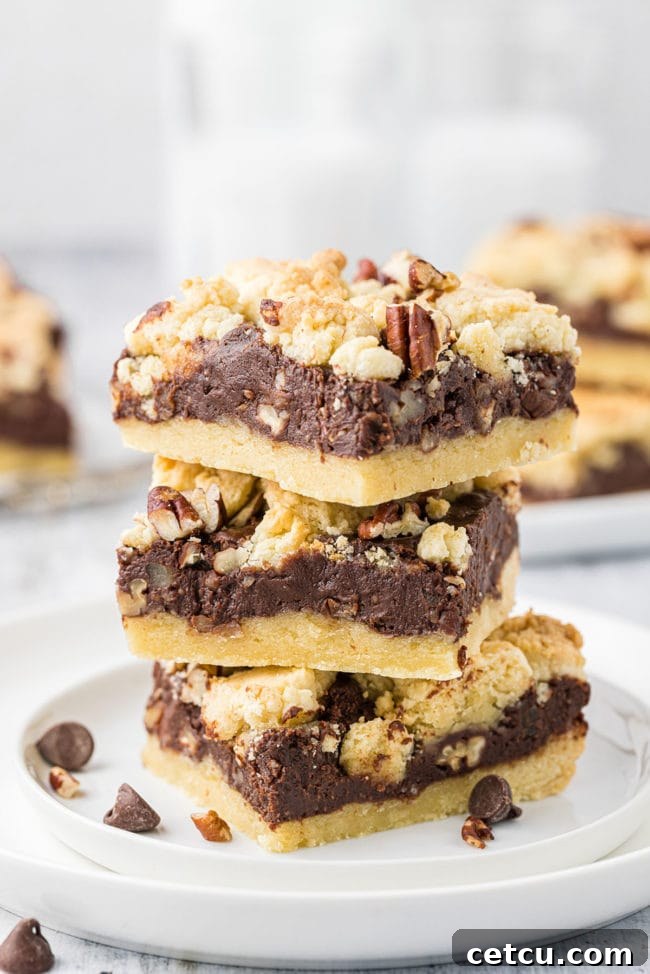 Stack of three perfectly layered fudge nut bars