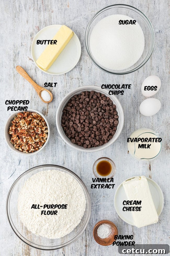 Ingredients laid out for making fudge nut bars on a kitchen counter
