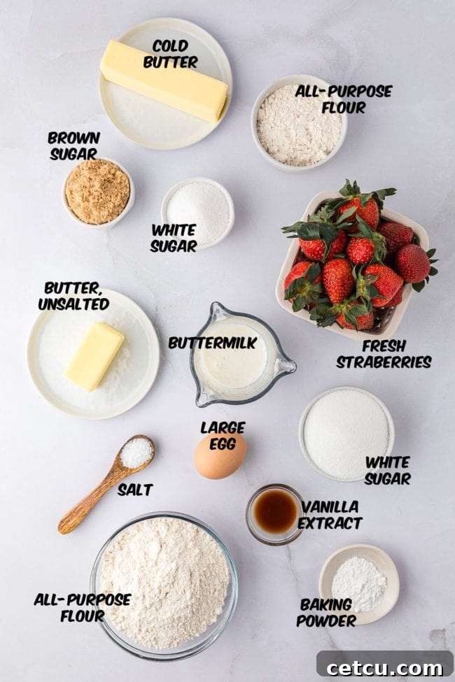 ingredients for strawberry muffins on a counter