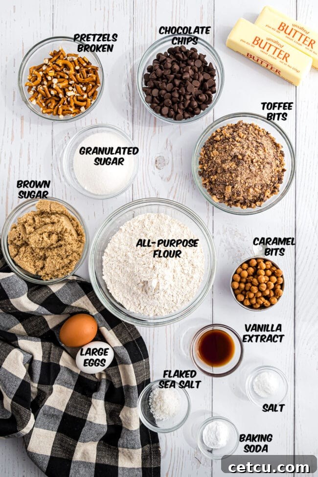 A vibrant display of all essential ingredients for the Kitchen Sink Cookie recipe, neatly arranged and ready for baking.