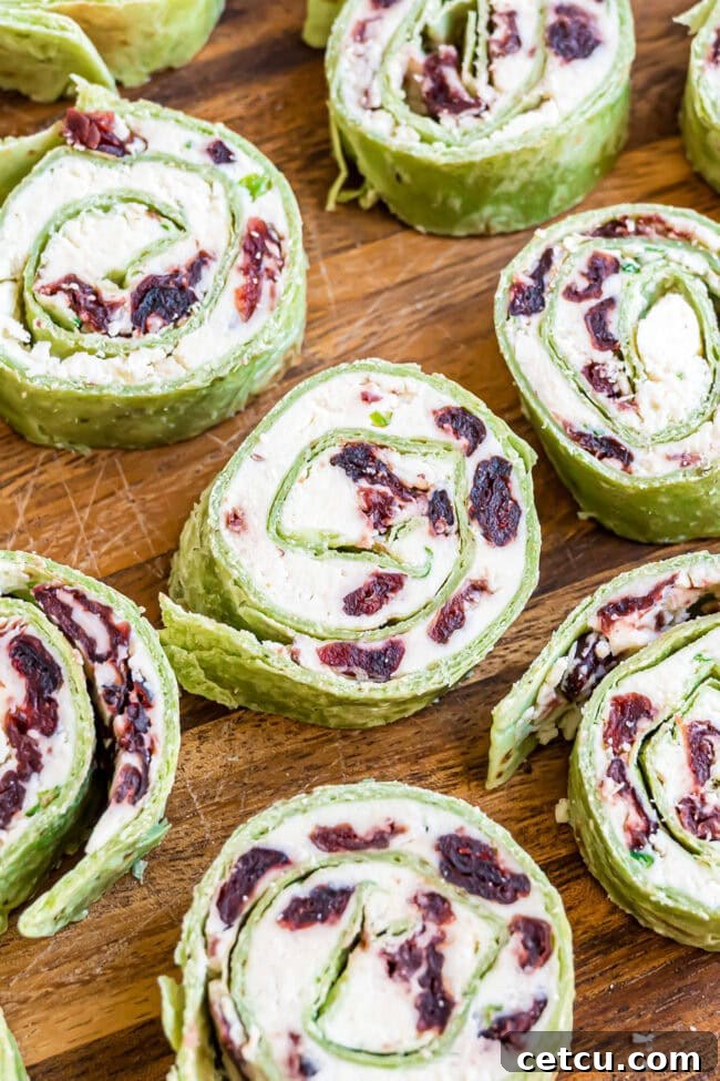 Cranberry Swirl Christmas Tree Bites 10 cranberry pin wheels with spinach tortillas
