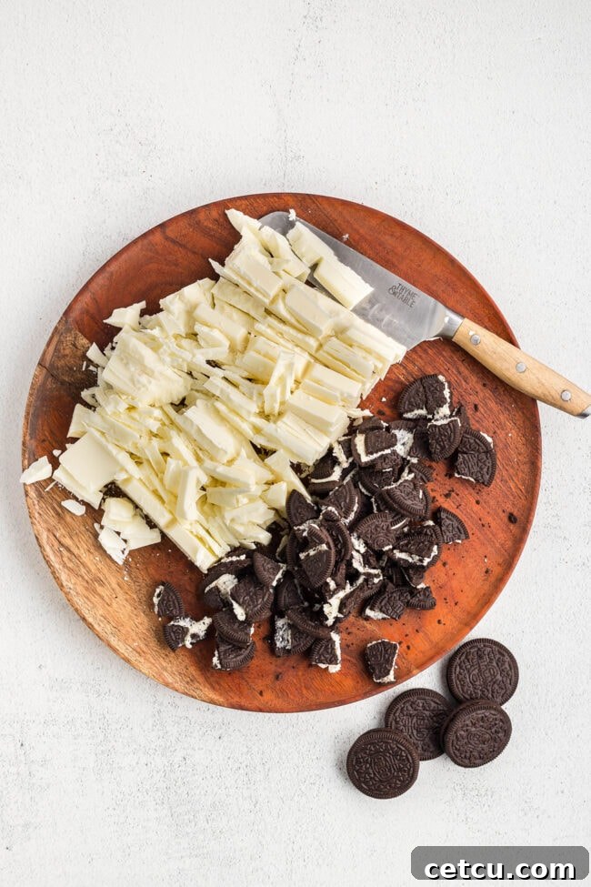 Oreo fudge step 1: Chopping vanilla almond bark