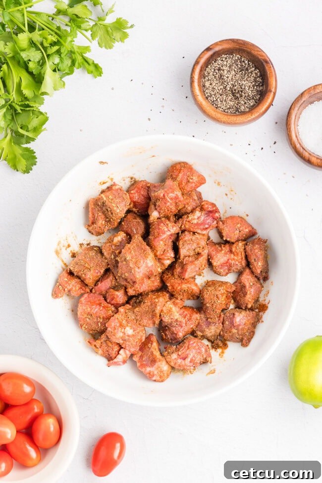 Southwest Steak Bowl Recipe: Creamy Southwest Sauce 4 Marinating cubed sirloin steak with lime juice, avocado oil, and Southwest seasonings before cooking.